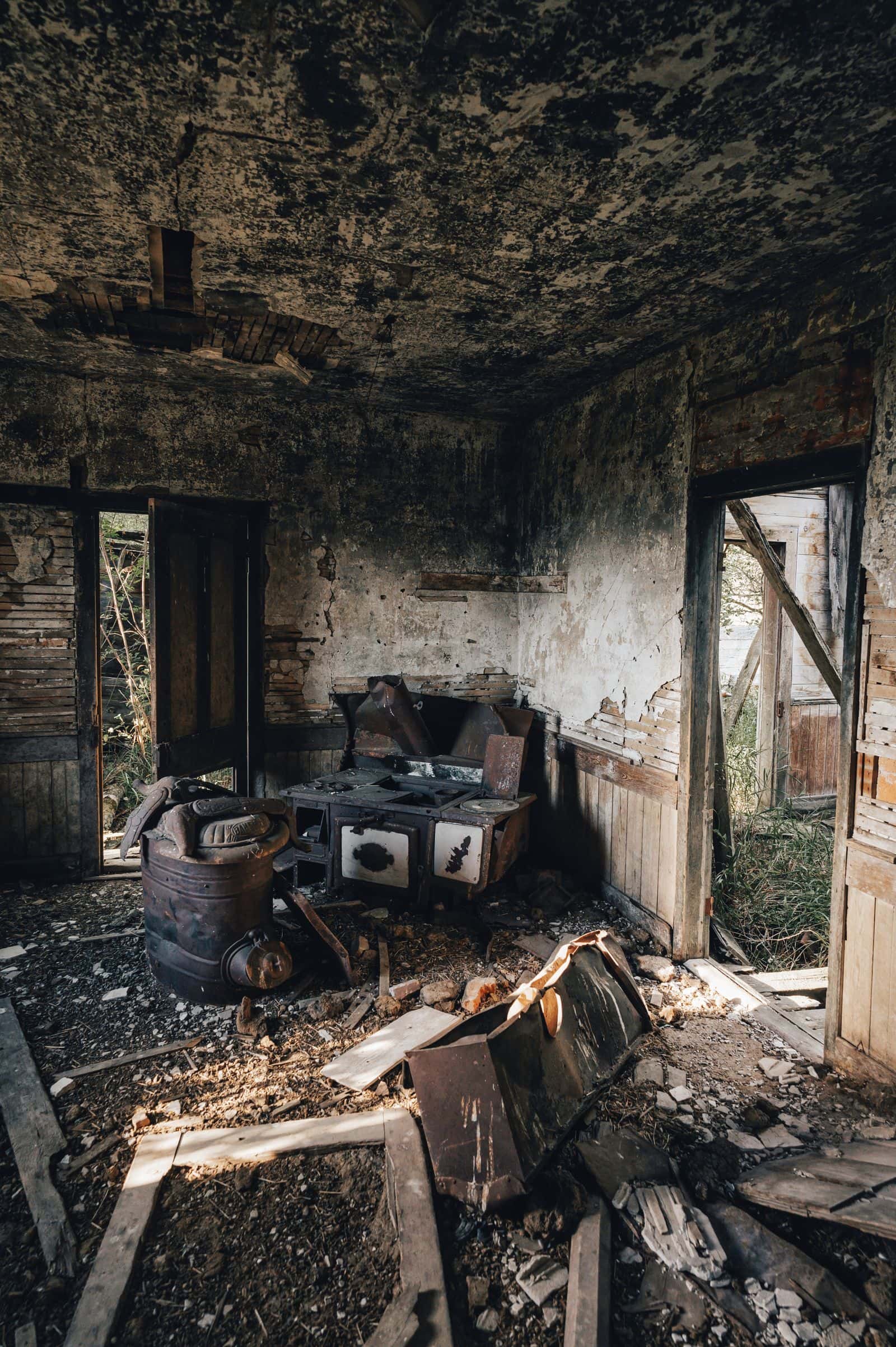 Kitchen interior damaged by fire and soot