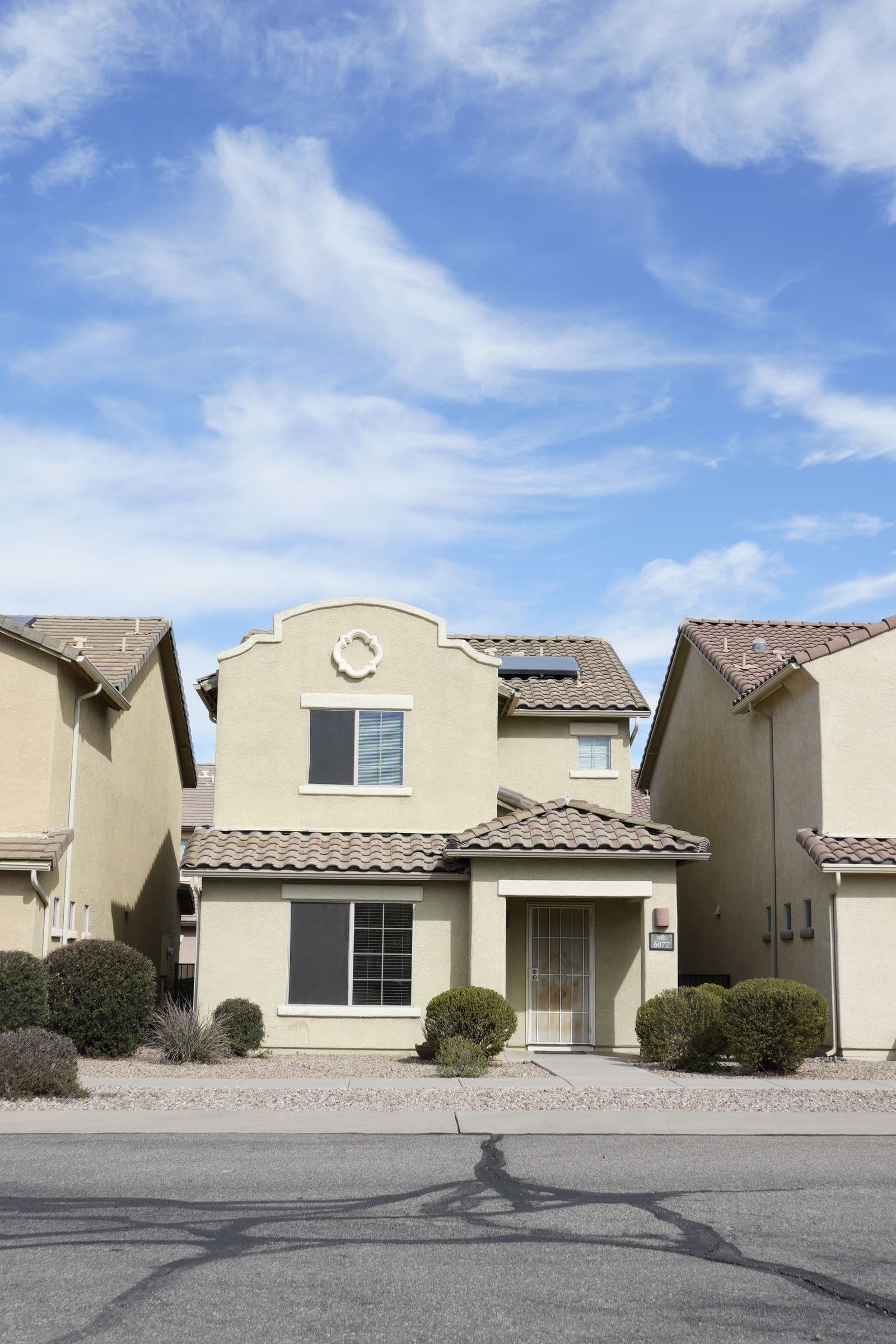 Stucco homes with tile roofs typical of the Apache Junction area